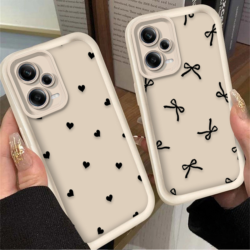 جراب هاتف أسود بتصميم قلب الحب - مراجعة Xiaomi Redmi Note 14 وسعره